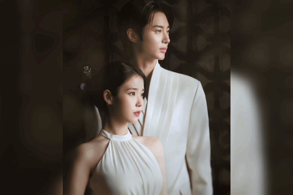 Homem e mulher com traços orientais e traje branco olhando para o lado