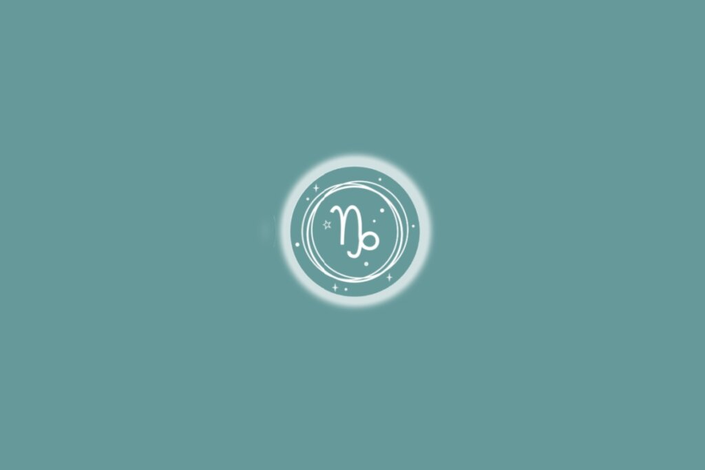 Ilustração do signo de capricórnio, em um círculo branco com estrelas, sobre um fundo verde