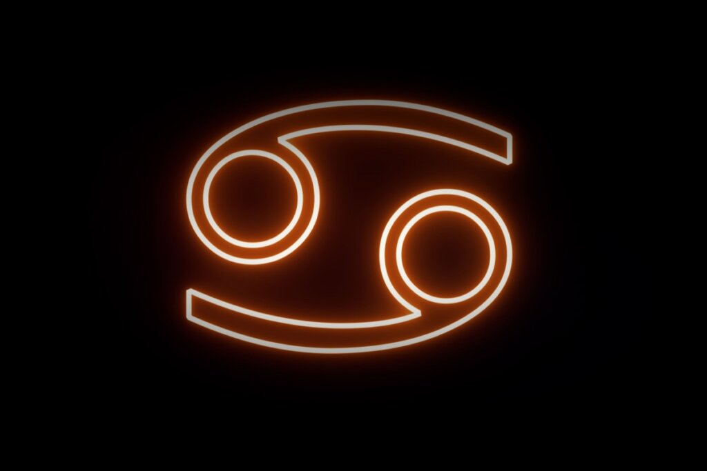 Ilustração digital do símbolo de Câncer (dois números seis deitados e entrelaçados, lembrando as garras de um caranguejo). O design apresenta um efeito de luz neon laranja sobre um fundo preto.