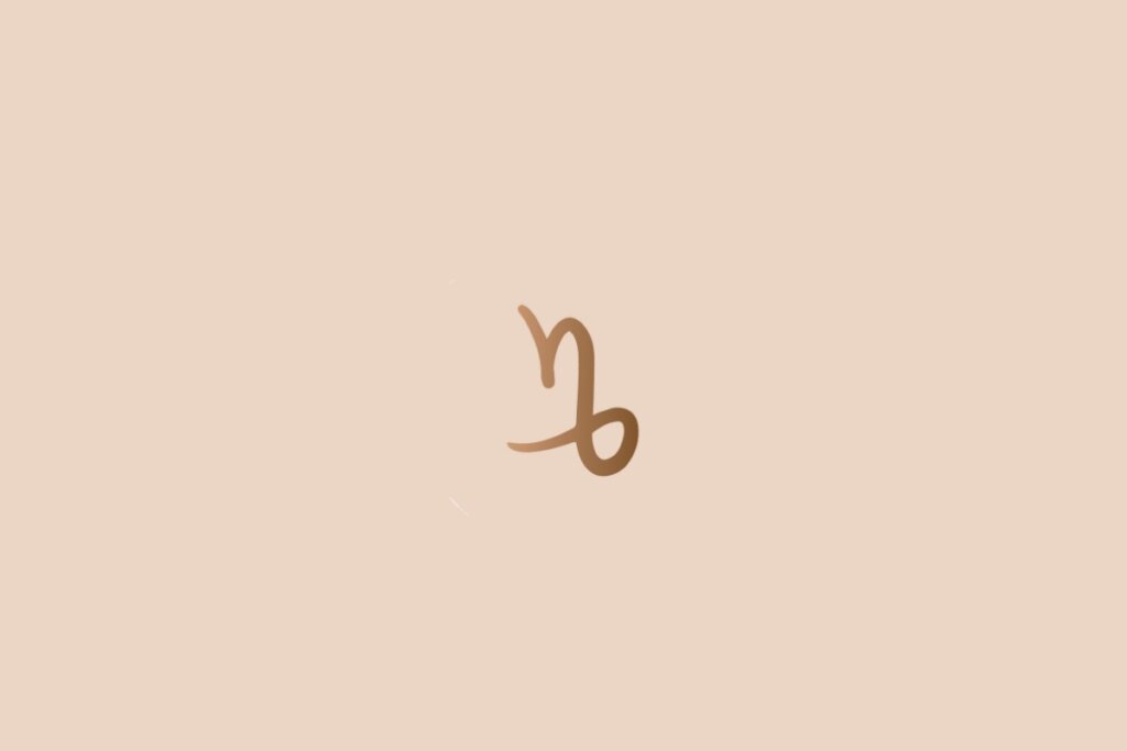 Ilustração do signo de capricórnio na cor marrom em um fundo bege-claro